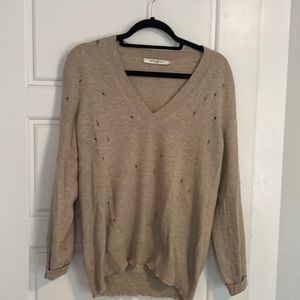Sweater with chic holes in it